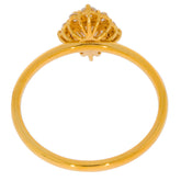 Gold ring with a decorative top design, showcasing an elegant band and intricate details.